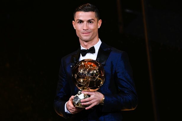 Cristiano Ronaldo with a Ballon d'Or trophy after winning five awards