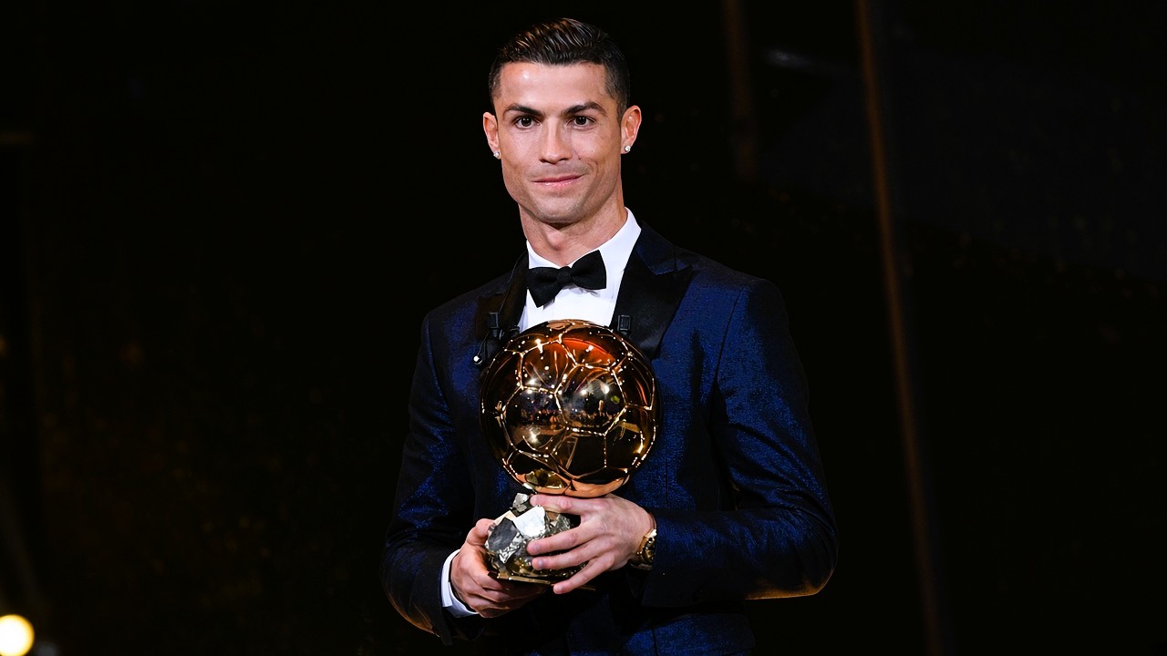 Cristiano Ronaldo with a Ballon d'Or trophy after winning five awards