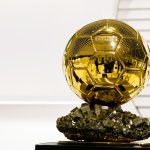 Golden football trophy silhouette surrounded by statistics and voting sheets, with the text BALLON D’OR RECORDS